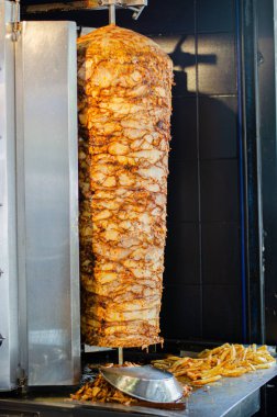 Meat on skewer for doner, traditional Turkish food