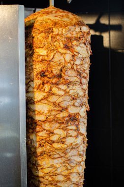 Meat on skewer for doner, traditional Turkish food