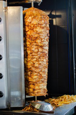 Meat on skewer for doner, traditional Turkish food