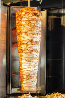 Meat on skewer for doner, traditional Turkish food