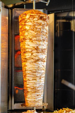 Meat on skewer for doner, traditional Turkish food