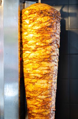 Meat on skewer for doner, traditional Turkish food