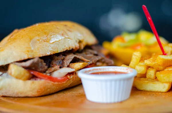 Meat doner kebab in sandwich bread. Traditional Turkish cuisine delicacies. Selective focus.