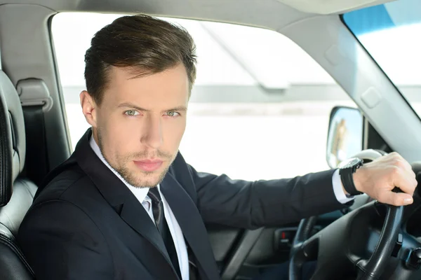 Zakenman in de auto — Stockfoto