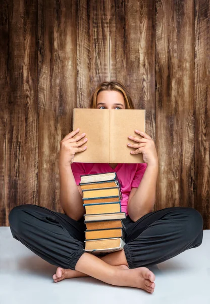 Teenage Girl Sitting Stack Books Peeking Out Text Book Wooden Stockbild