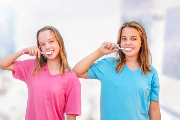 Teenage Girls Brush Teeth Bathroom Together Morning — Stok fotoğraf