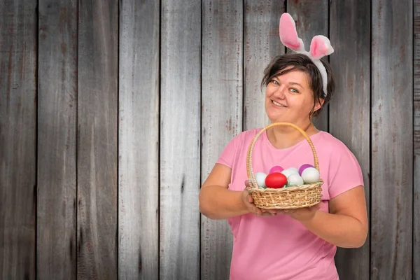 Woman Bunny Ears Easter Eggs Basket Wooden Background — Zdjęcie stockowe