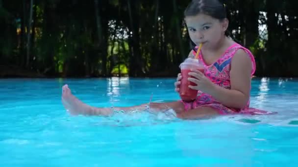 Child Sits Water Drinks Juice Pool Vacation — Stock Video