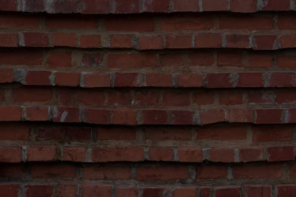 Tarihi evin eski kırmızı tuğla duvarının bir parçası, desen, kapat.