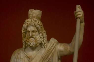 Plüton ve Persephone 'nin grup heykelindeki tanrı Plüton' un başı. Plüton-Sarapis 'in kafasında tahıl ölçümü için kullanılan bir alet olan modifiye var. Gortyna, Mısır Tanrıları Tapınağı, Roma dönemi, orta. İki sent. AD