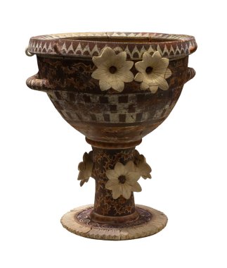 Luxury Kamares vessel for banqueting ceremonies from Phaistos richly decorated with polychrome and relief patterns. Isolated object on white background