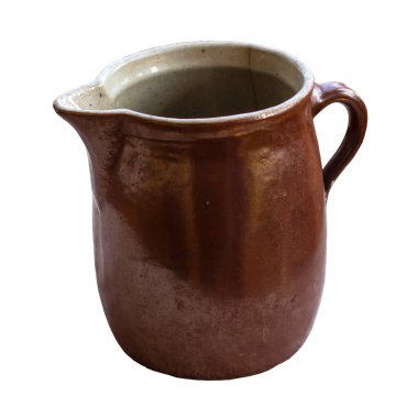 Old brown enamel jug close-up isolated on white background. Front view