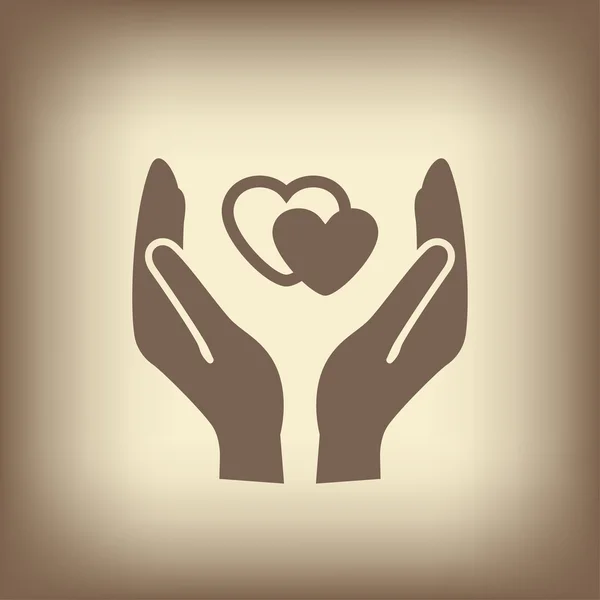 Heart in hand icon — Stock Vector