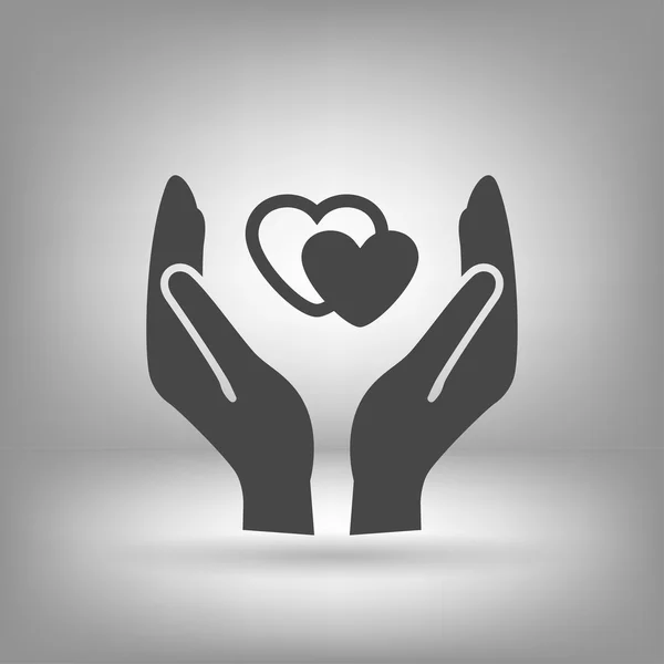 Heart in hand icon — Stock Vector