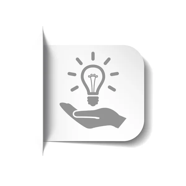 Žárovka v ikona ruky — Stockový vektor