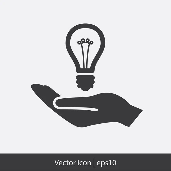 Light bulb in hand — Stock Vector