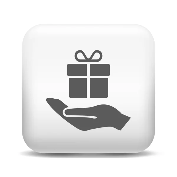 Cadeau dans la main icône — Image vectorielle