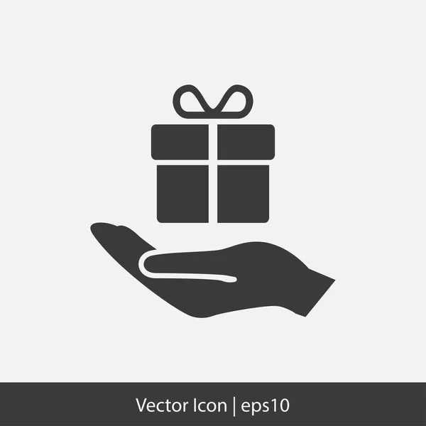 Gift in hand icon — Stock Vector