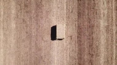 Hay bales in a field - Aerial footage. 