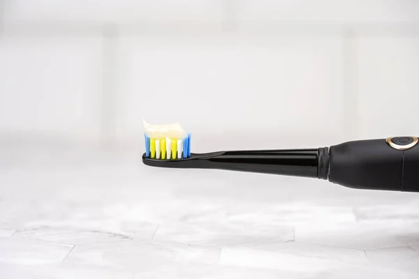 Modern Electric Toothbrush Toothpaste Closeup — Stock Photo, Image