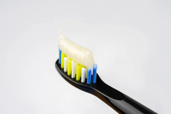 Nowoczesna Elektryczna Szczoteczka Zębów Zbliżeniem Pasty Zębów — Zdjęcie stockowe