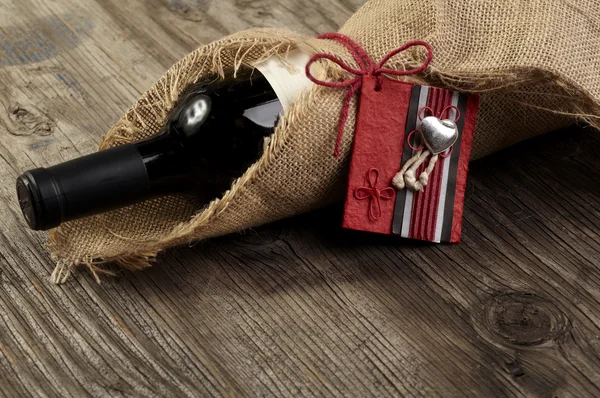 Bouteille de vin rouge avec un message — Photo