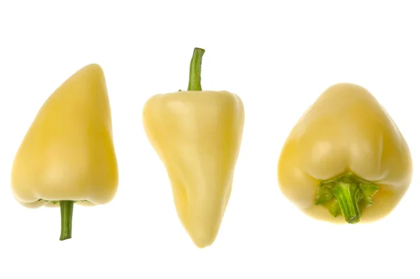 Three sweet yellow peppers — Stok fotoğraf