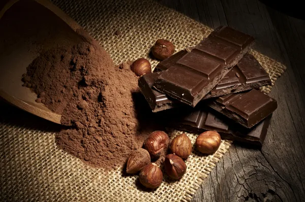 Chocolate with nuts and cocoa — Stock Photo, Image