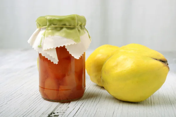 Jar with a jam from a quince — Stock Photo, Image