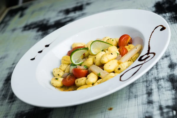 Gnocchi on a plate — Stock Photo, Image