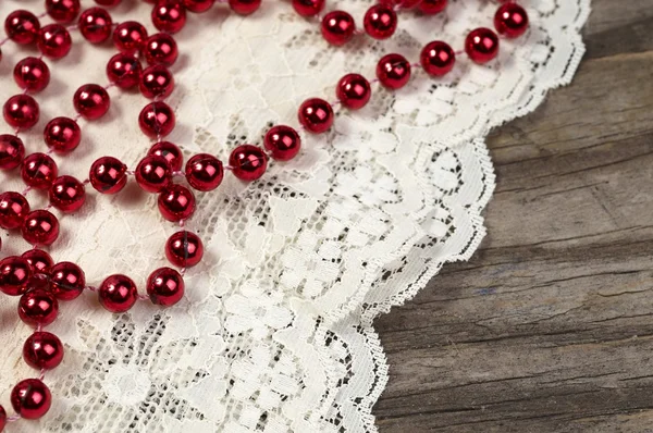 Red pearls and lace — Stock Photo, Image