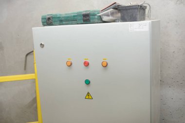 Electrical control cabinet. Closed door with indicators.