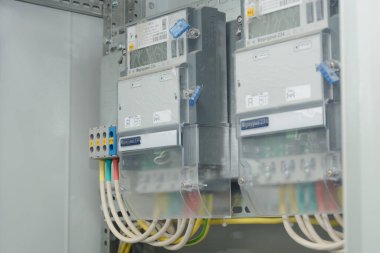 Volgograd, Russia - July 2021: Two electric meters for electricity metering. Close-up. selective focus.