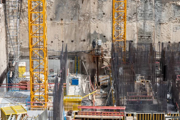 Construction site background. Hoisting cranes and new multi storey buildings. Industrial background. Close Up of Somail complex in Tel Aviv. Construction work on the new Tel Aviv Municipality building