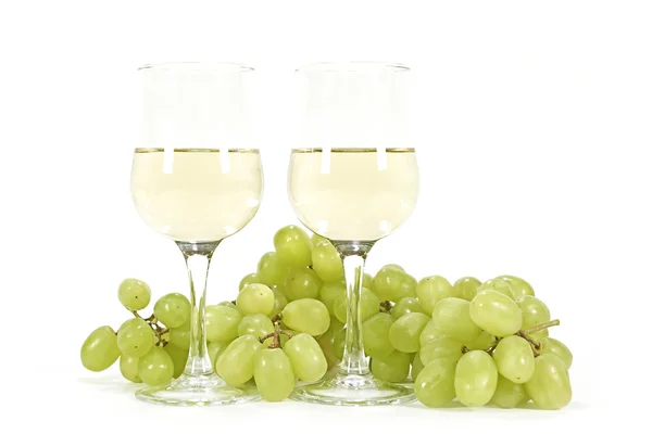 White wine and green grapes — Stock Photo, Image