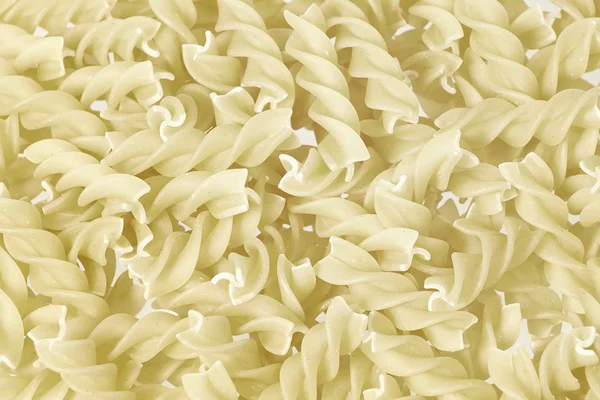 Raw pasta twists — Stock Photo, Image