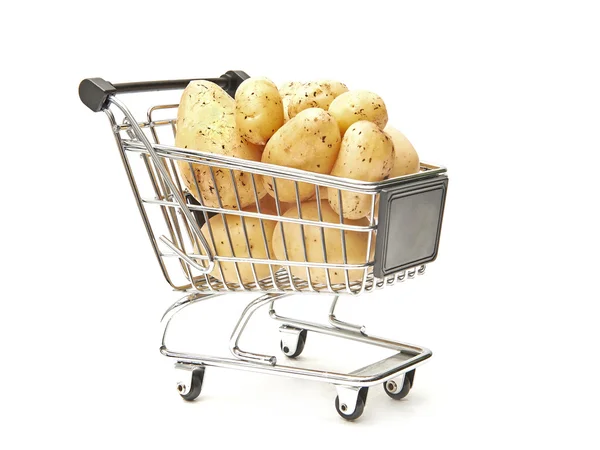 Shopping cart filled with potatoes — Stock Photo, Image