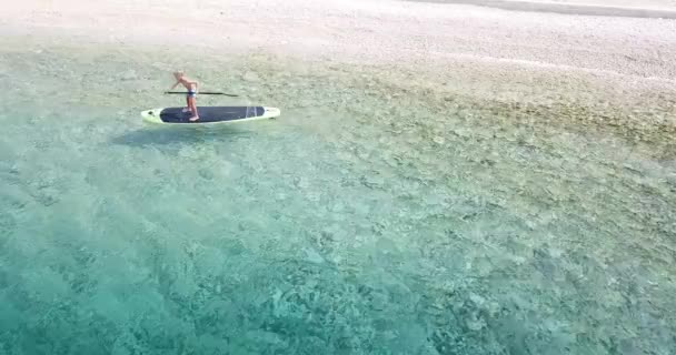 Summer Time Sea Aerial View Child Paddleboard Cute Child Learning — Stock Video