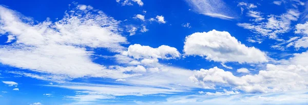 White cumulus clouds blue sky background panorama, beautiful cloudscape wide panoramic view, cloudy skies backdrop, fluffy cloud texture, sunny day heaven, cloudiness weather, ozone layer, copy space
