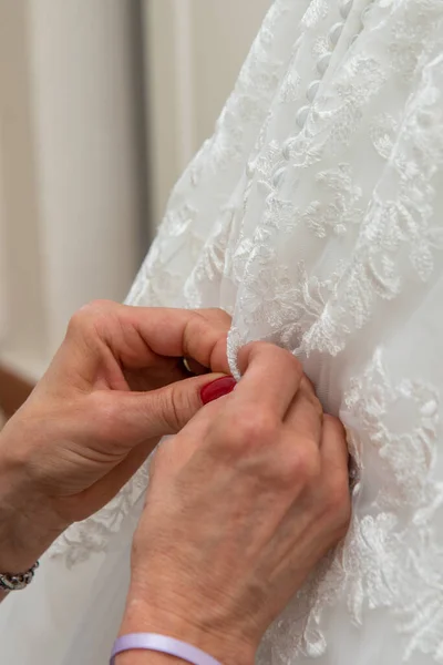 July 2022 Italy Woman Hands Fasten Buttons Bride Formal Dress — Zdjęcie stockowe