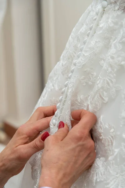 July 2022 Italy Woman Hands Fasten Buttons Bride Formal Dress — Zdjęcie stockowe
