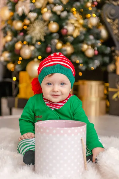 Cute Little Boy Dressed Elf Opens Christmas Present Decorated Christmas — Stock Photo, Image