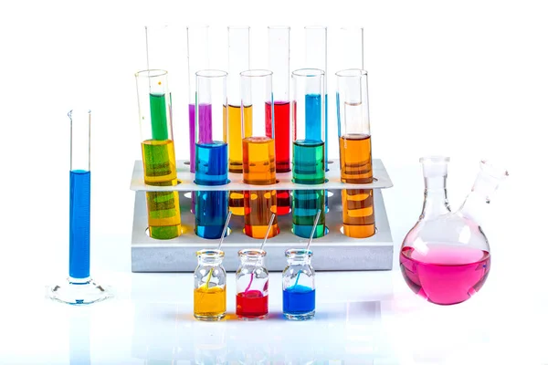 Glass Laboratory Materials Erlenmeyer Tubes Measuring Cylinder Containing Colored Liquids — Foto Stock