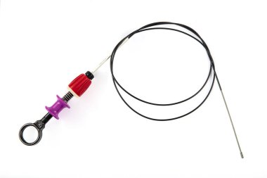 A balloon inflation device used in angioplasty procedure. Mesh metal balloon-expandable stent for endovascular surgery sinning on the delivery device.