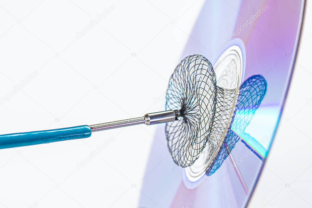 Atrial Septal Defekt. Devices for invasive cardiology procedures. Device for atrial septal defect closure on a white background. patent foramen ovale PFO closure device. 