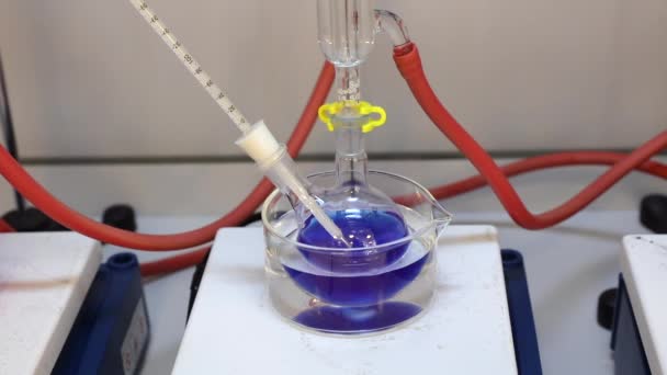 Mixing Colored Solution Magnetic Stirrer Formation Chemical Reaction Video — Stock Video