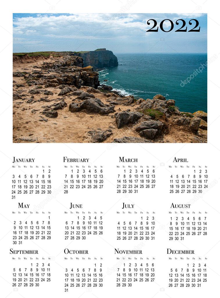 Calendar card for 2022. Beautiful seaside landscape. View of the rocks. Tenby Wales England.