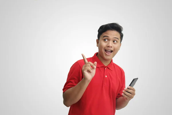 Portrait Excited Asian Man Red Polo Shirt Standing Gray Background — Stok Foto
