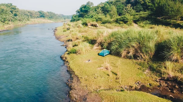 aerial view of camping by the river