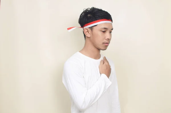Young Indonesian Man Hands Chest Celebrating Independence Day — Foto de Stock